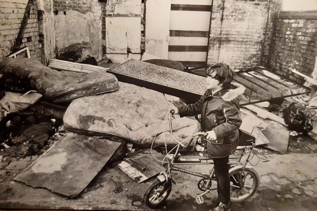 A young boy plays near the Ashton Road rubbish tip which nearby residents believed was infested with rats, March 1980