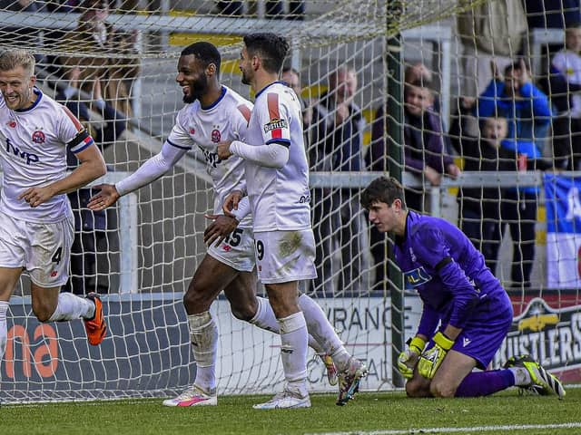 Harry Davis celebrates scoring AFC Fylde's third goal against Leek Town Picture: Steve McLellan