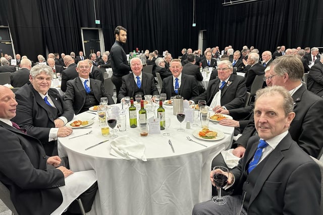 The Freemasons take a break from the formalities to enjoy a festive lunch.