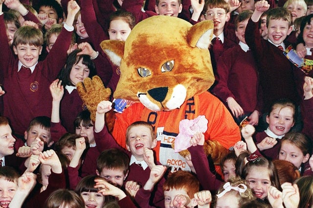 Blackpool Football Club mascot Cable Cat dropped in on children from Ansdell County Primary School to invite them to Bloomfield Rd for "Quid a Kid"