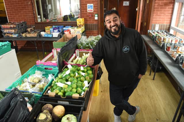 Taz Ali of Preston Community Hub celebrates being awarded a British Empire Medal (BEM) Photo: Neil Cross