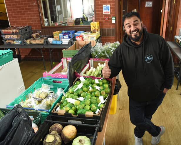 Taz Ali of Preston Community Hub celebrates being awarded a British Empire Medal (BEM)   Photo: Neil Cross