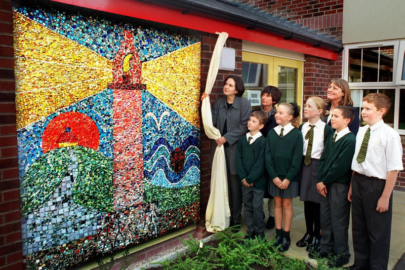 Wyre Borough Council Arts Development Officer Heather Fox, unveiled a new mosaic at Shakespeare School. From left, Heather Fox, Brent Crompton, artist Norma Tait,  Rebecca Cutting, Zoey Taylor, headteacher Margaret Lund, Shaun O'Connor and Adam Tripp, 1997