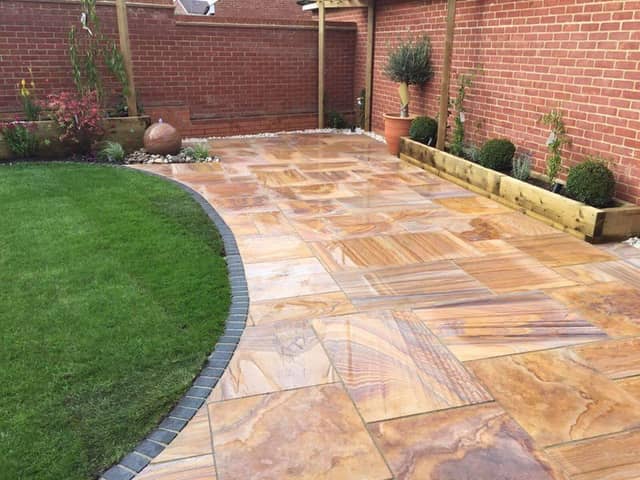 Cleaning patios and paving slabs without a pressure washer can be effectively achieved with some simple hacks. Photo: Paving Shopper