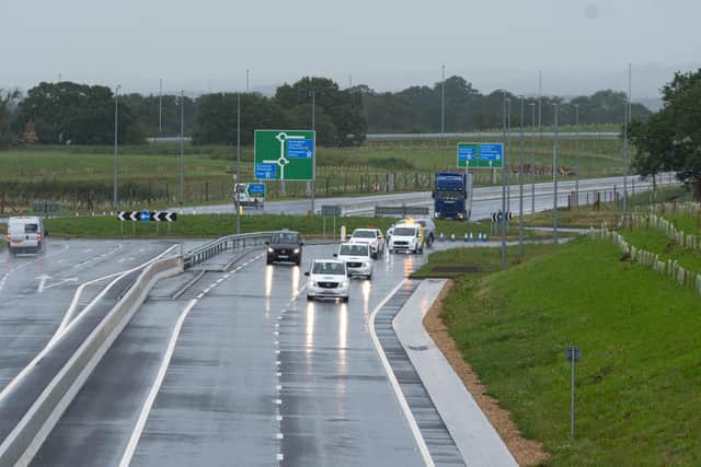 The first vehicles travel on the Preston Western Distributor link road after its opening