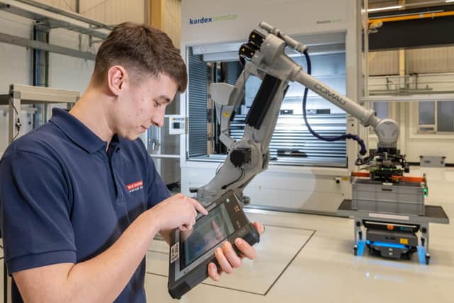 Operator uses ruggedised tablet data to tap into realtime factory data and analysis tools in BAE Systems' Factory fo the Future at Warton
