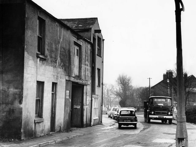 This old mill building in Queensway was demolished to make way for road improvements. The land on the right now houses Poulton Library