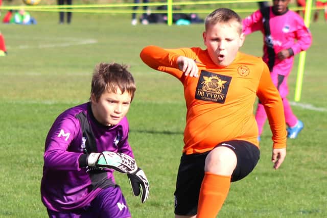 The YMCA Orange and FC Rangers U10s showed their development last weekend Picture: Karen Tebbutt