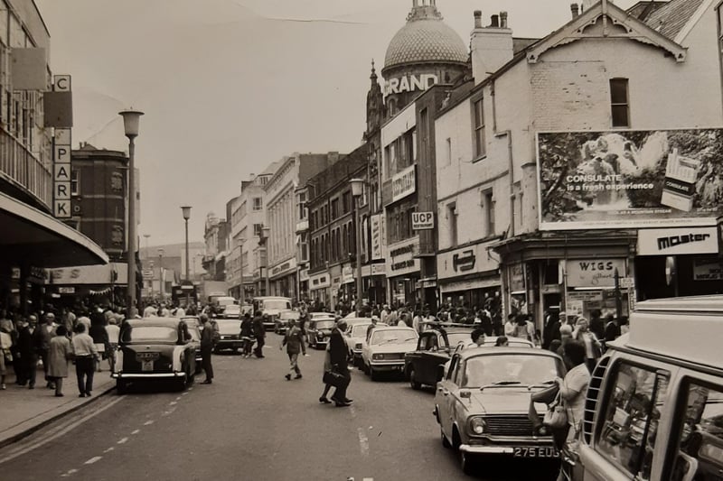 The town centre was blocked by traffic according to caption on the back of this 1972 photo. The Grand Theatre's domed roof can be seen clearly in the background