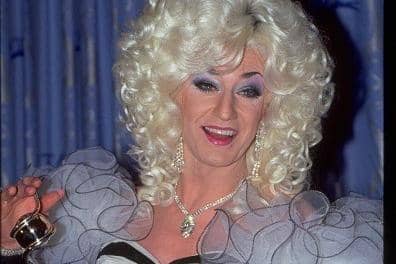 Paul O'Grady dressed as his drag queen alter ago Lily Savage at the National Television Awards at the Royal Albert Hall in London on October 8, 1997.