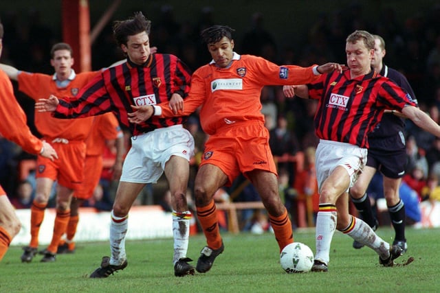 Blackpool's Andy Preece battles against Watford in 1998. The centre forward played for the Tangerines from 1995–1998, making 129 appearances, scoring 35 goals