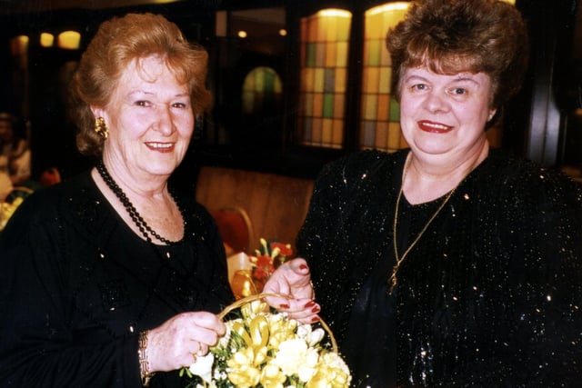 Mrs Doreen Woods seen presenting flowers to Miss Marilyn Wilson, Chairman of the Blackpool & Fylde Light Operatic Company at the Annual Dinner and Dance