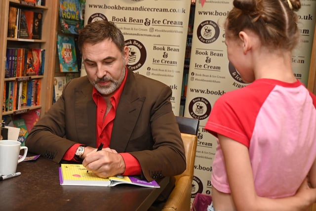LANCASHIRE POST - BLACKPOOL - 15-07-23 Celebrity, comedian and children's author David Walliams promotes his new book, The World's Worst Monsters, at Book Bean and Ice Cream, Kirkham, where he met excited fans and their parents, signed booked and posed for photographs.