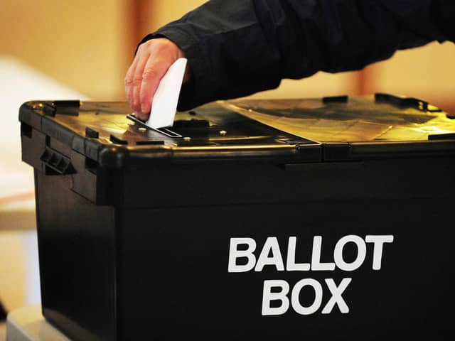 A voter placing a ballot paper in the ballot box. PIC: Rui Vieira/PA Wire