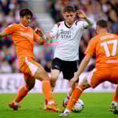 Blackpool claimed a 2-0 victory over Derby County