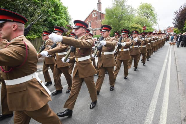 The Duke of Lancaster regiment marches through the streets of Poulton-le-Fylde