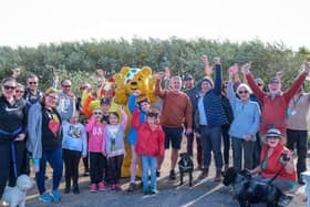 Pudsey Bear with walkers at last year's fund-raiser at Fairhaven Lake