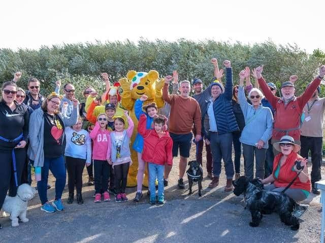 Pudsey Bear with walkers at last year's fund-raiser at Fairhaven Lake