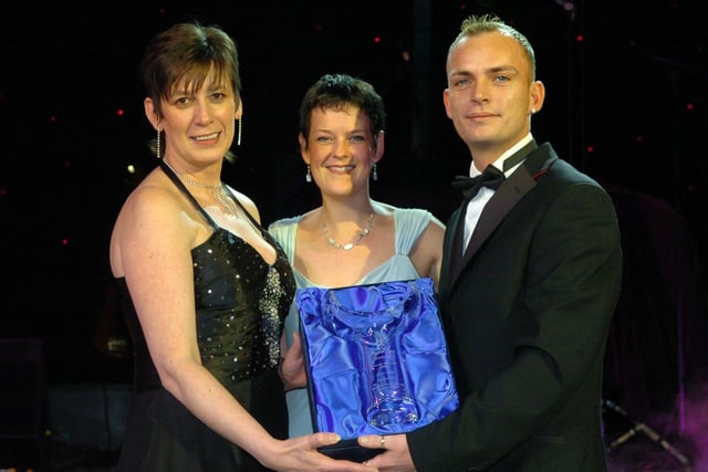Alison Gilmore (centre) from Blackpool Exhibition and Conference Halls presents Jackie Meeghan and Robbie Pendlebury from the Grand Theatre with the Welcome All Award at the Blackpool Tourism Business Excellence Awards 2006