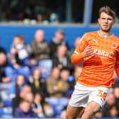 Brad Holmes gave Blackpool a first-half lead with a composed finish