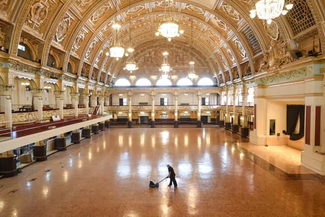 The old floor at the Empress Ballroom has been uncovered and restored at The Winter Gardens. Coral Orgill is pictured buffing the floor.