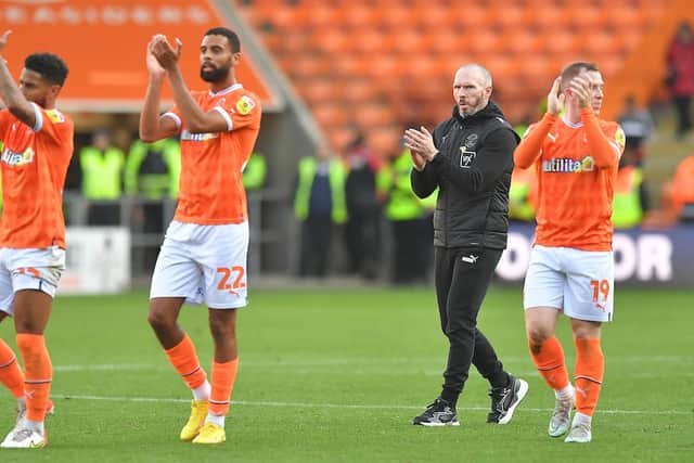Michael Appleton applauds the fans after the game