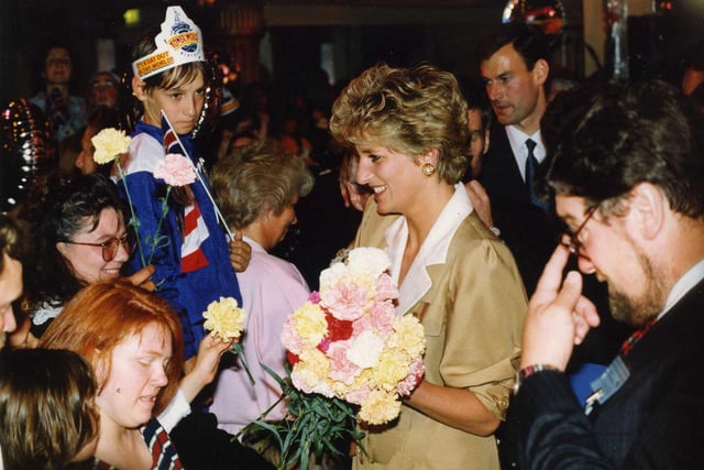 Princess Diana meets some of the many people gathered in Blackpool during her visit