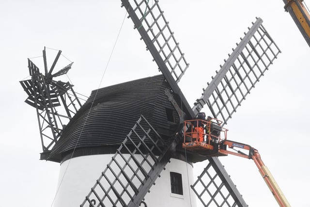 Attaching the sails to the windshaft are an essential part of the operation