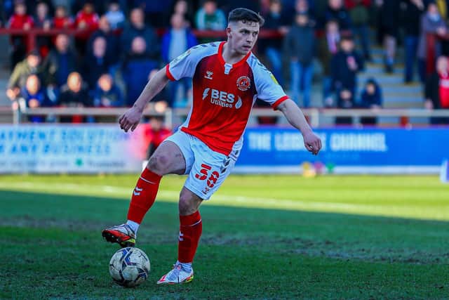 Fleetwood Town midfielder Carl Johnston has signed up for the next three seasons at Highbury