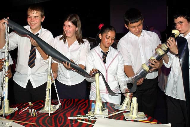 The Vertical Challenge rollercoaster design competition in 2003. From left, Leon Serle, Marc Podsesta, Stacey Sagar, Rubiya Aslam, John Clements, Greg Hartley