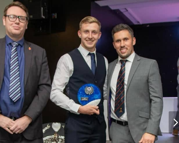 Palace Shield cricket awards double winner Joshua Sackfield with Simon Kerrigan and Paul Williams (left) of league sponsors Moore and Smalley Photo: STEVEN TAYLOR / SJT