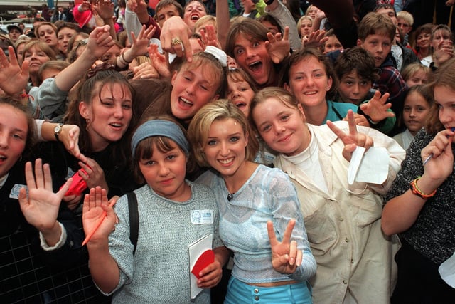 Danny Minogue meets the crowd during a broadcast from Blackpool Pleasure Beach for the Big Breakfast