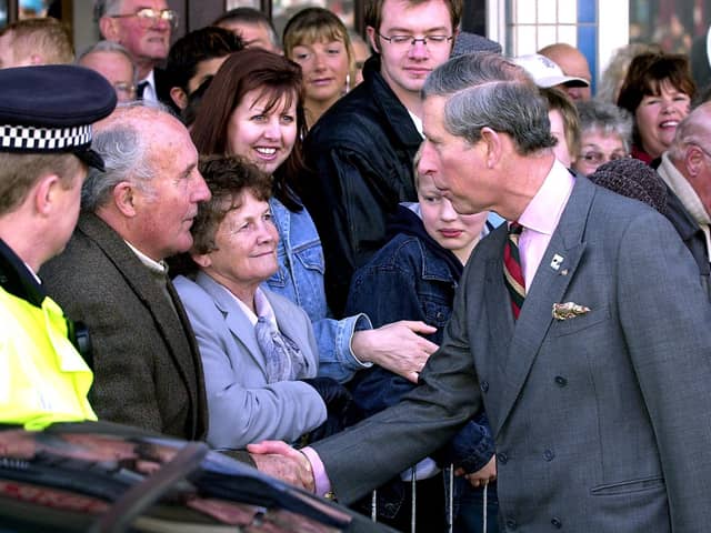 Prince Charles chats to the crowd outside the Winter Gardens for the Rotary Conference