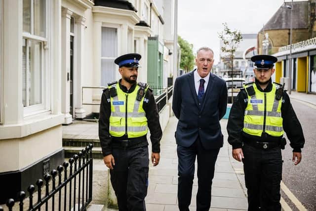 Lancashire PCC Clive Grunshaw with officers.
