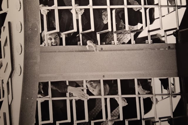 A view through the top of the cage which catapulted people up in the air on the Ranger Ride, 1983