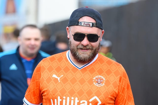 Blackpool fans arrive at Turf Moor ahead of the fixture with Burnley. Photo: Kelvin Stuttard