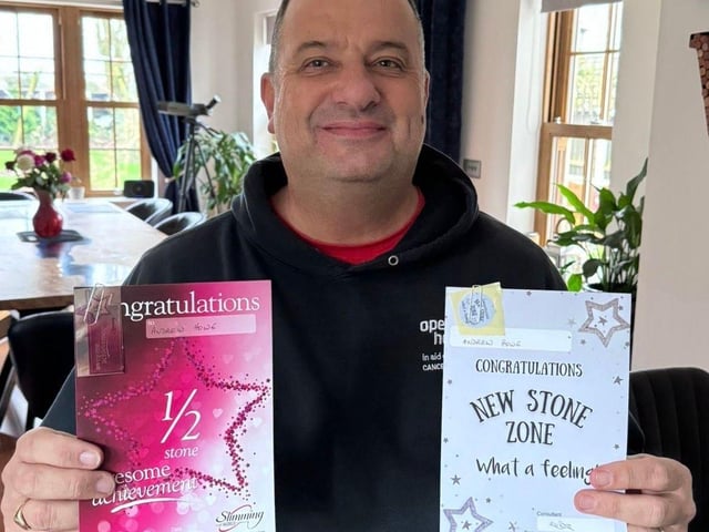 Andrew receiving his first weight loss award is now 3 stone lighter!