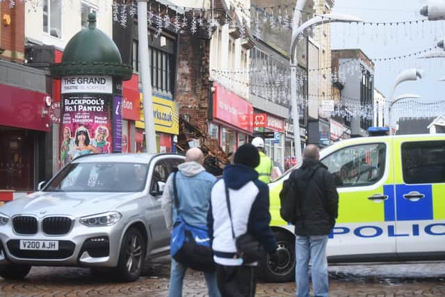 Crowds of worried residents and shoppers gathered to watch the incident in Church Street unfold