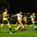 Blackpool came from two goals down to progress in the EFL Trophy.