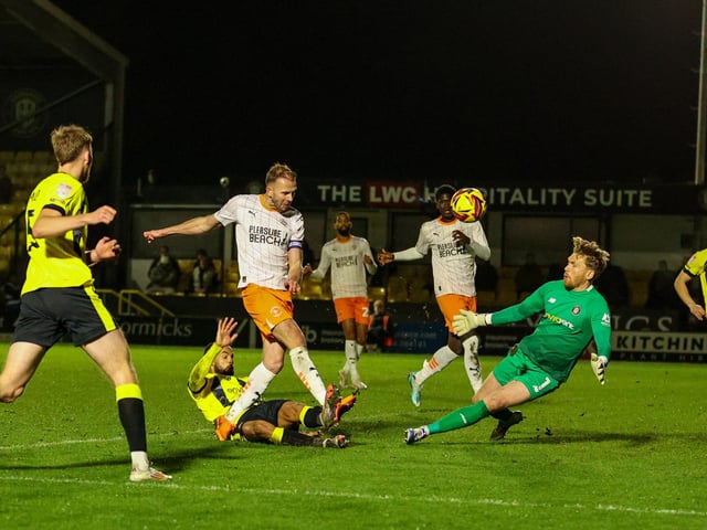 Blackpool came from two goals down to progress in the EFL Trophy.