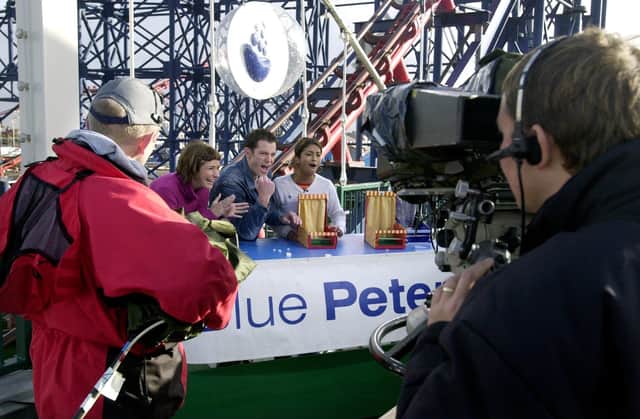 Blue Peter filming live at Blackpool Pleasure Beach, with presenters Liz Barker, Matt Baker and Konnie Huq at the make table back in October 2000. The programme made more than one visit the famous amusement park.