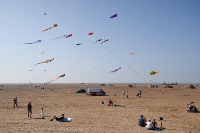 Kites flying overhead could be seen from miles around as people took part in volleyball, running races, rugby and football matches, cricket and rounders on the golden sands.