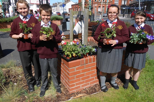 Pupils from Charles Saer Primary School in Fleetwood planted a Diamond Jubilee flower display at Fleetwood's Pocket Park. From left: Simon Stirzaker, Connor Johnston, Sunita Crabtree and Bethany Croft.