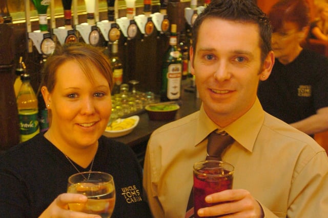 The opening night at the newly Refurbished Uncle Tom's Cabin. Bar staff Sean Tobin and Bonnie Turner raise a glass