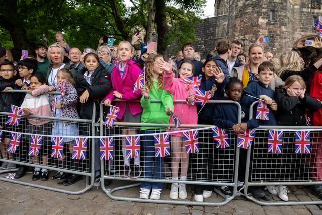 Members of the public wave goodbye to King Charles III. Photo: Kelvin Lister-Stuttard.