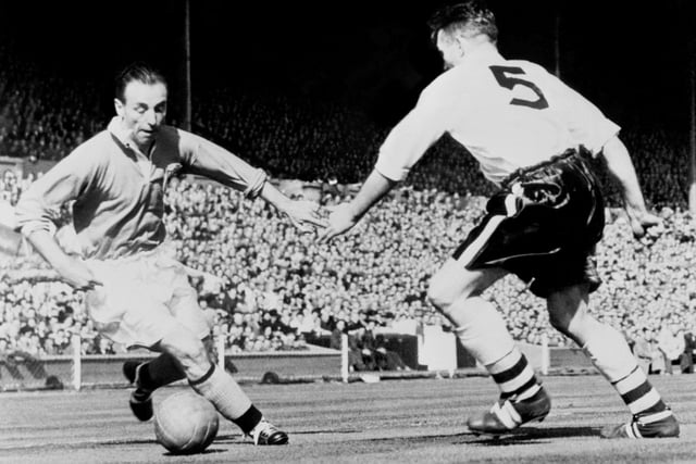 Stanley Matthews embarks on one of his mazy runs down the right wing