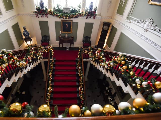 Lytham Hall's main stairway in all its festive glory.