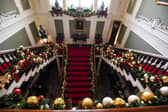 Lytham Hall's main stairway in all its festive glory.