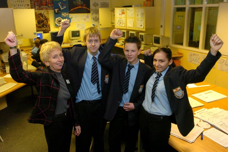 Pupils at Collegiate High School celebrate a good positioning in the government's education league tables. L-R are Headteacher Gill Fennel, Paul Bostock (15), Sonny Miles-Currey (15) and Keri Westhead (16)
