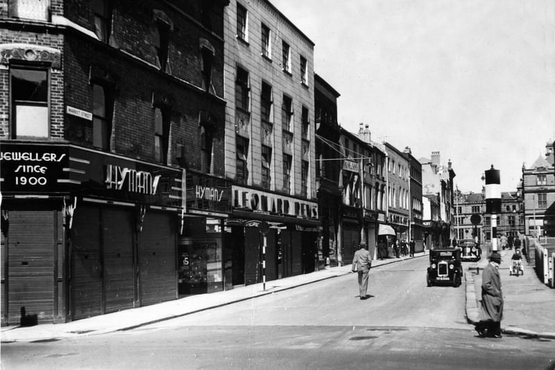Market Street taken from the south end of the street. This 1953 photo shows Hymans and Leonard Dews jewellers on the left and the site of the old St John's market just visible on the right where BHS would be built